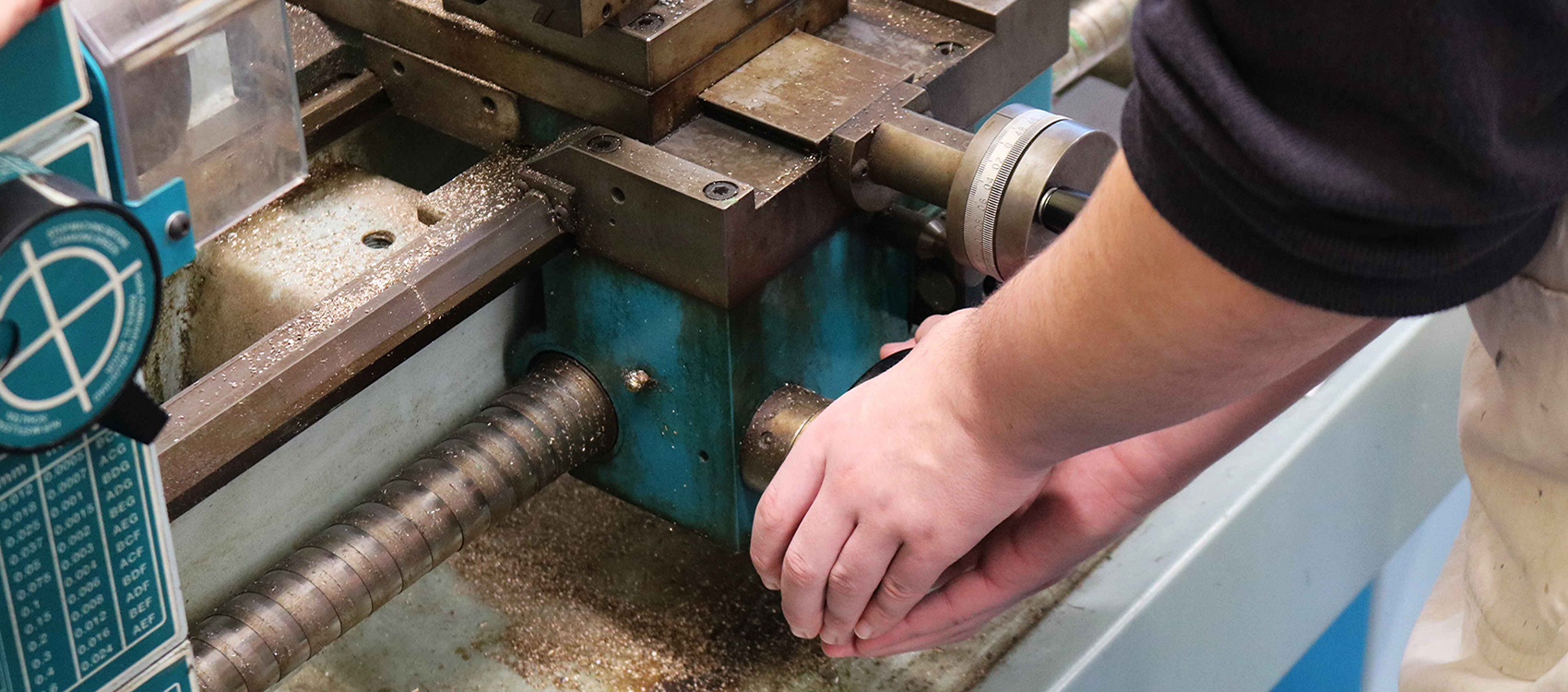 Kennet Sixth Form student operating state-of-the-art equipment in the Design & Technology workshop Kennet Sixth Form student operating state-of-the-art equipment in the Design & Technology workshop